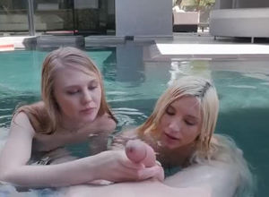 2 damsel women inhale in the pool