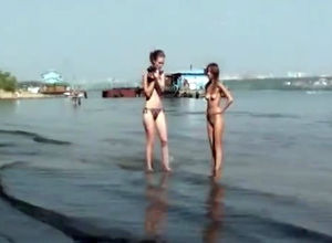 Bare young womans on the beach for..