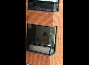 Spycam orgy  filmed thru dormitory..