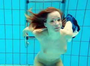 Porno shooting underwater. Naked Maiden